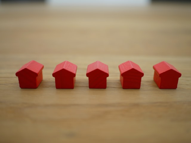 Red blocks in small house shapes